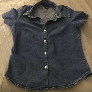 A denim short sleeve button down top.